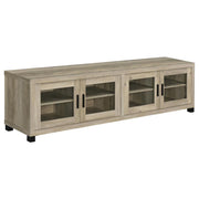 Sachin 4-door 79-inch TV stand in light wood finish, angled front view with glass cabinet doors.